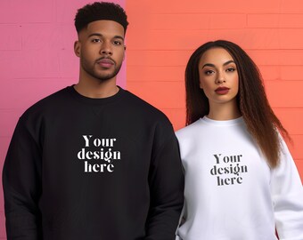 May include: Two people wearing black and white sweatshirts with the text "Your design here" printed on the front. The person on the left is wearing a black sweatshirt and the person on the right is wearing a white sweatshirt.