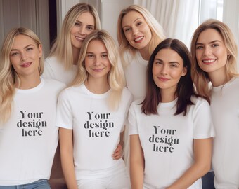 May include: A group of six people wearing white crew neck t-shirts. The text "Your design here" is printed on the front of the shirts. The people are smiling and posing for the camera. Some are wearing blue jeans, while others are wearing white pants.