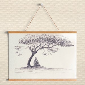 May include: A pen and ink drawing of a person meditating under a tree. The artwork is displayed on a white canvas with wooden bars at the top and bottom. A string is used to hang the artwork.
