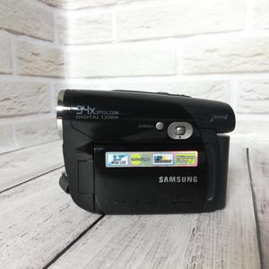 Videocámara digital Samsung VP-DC175WB con tarjeta de memoria SD y mini DVD