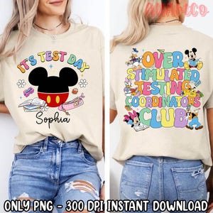 May include: Beige t-shirt featuring a Mickey Mouse design with the text "IT'S TEST DAY" and the name "Sophia". The back of the shirt displays the text "OVER STIMULATED TESTING COORDINATORS CLUB" with various Disney characters.