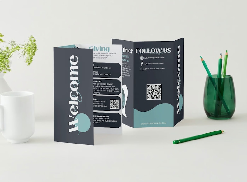 May include: A tri-fold brochure with a dark blue background and teal accents. The front panel says "Welcome" in a stylized font. The second panel has the heading "Giving" and lists information about giving to the church. The third panel has the heading "Follow Us" and includes social media handles and a QR code. The back panel says "Welcome" in a stylized font.