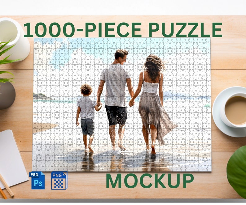 May include: A 1000-piece jigsaw puzzle mockup featuring a family of three walking on a beach. The puzzle is white with a light blue sky and ocean in the background. The family is made up of a man, a woman, and a child. The man is wearing a blue shirt and black shorts. The woman is wearing a white shirt and a long, flowing skirt. The child is wearing a blue shirt and shorts.