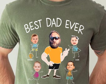 May include: Olive green t-shirt with the text "BEST DAD EVER" in white. The shirt features a cartoon illustration of a man in sunglasses and four children. The children's names are Daniel, Emma, Lisa, and Jackson.