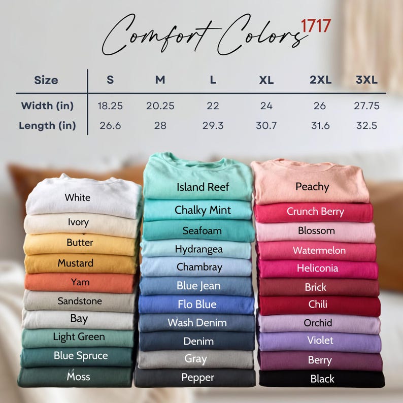 May include: A size chart for Comfort Colors 1717 t-shirts with width and length measurements in inches for sizes S through 3XL, displayed above three vertical stacks of folded t-shirts in various colors including white, blue, pink, and black.