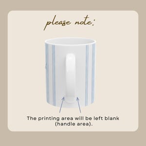 May include: A white ceramic mug featuring vertical light blue stripes. The text 'please note:' appears above the mug, and the text 'The printing area will be left blank (handle area).' appears below, with arrows pointing to the handle.