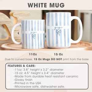 May include: White ceramic mugs with blue vertical stripes and the word "gigi" in script with a bow graphic. The mugs are available in 11oz and 15oz sizes. The 11oz mug is 3.8" high and 3.2" in diameter. The 15oz mug is 4.5" high and 3.4" in diameter.