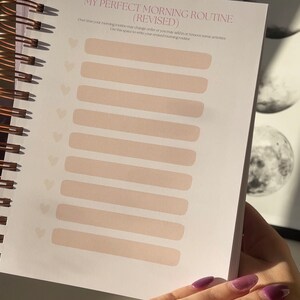May include: A white page with the title "My Perfect Morning Routine (Revised)" and a list of blank lines for writing down a morning routine.