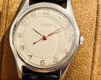 Reloj de pulsera para hombre Universal Geneve, reloj de oficial, caja de acero, segundero central, alrededor de 1940, cuerda manual, estado original, reloj de coleccionista raro