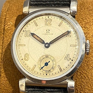 Art Deco men&#39;s wristwatch Omega Scarabeus around 1935 original condition steel case flexible lugs luminous numerals Natostrap collector&#39;s watch