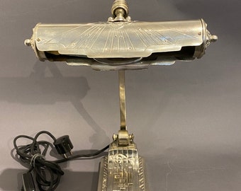 Rare Art Deco desk lamp/piano lamp made of nickel-plated metal, adjustable with ball head and tilt grid with musical motifs