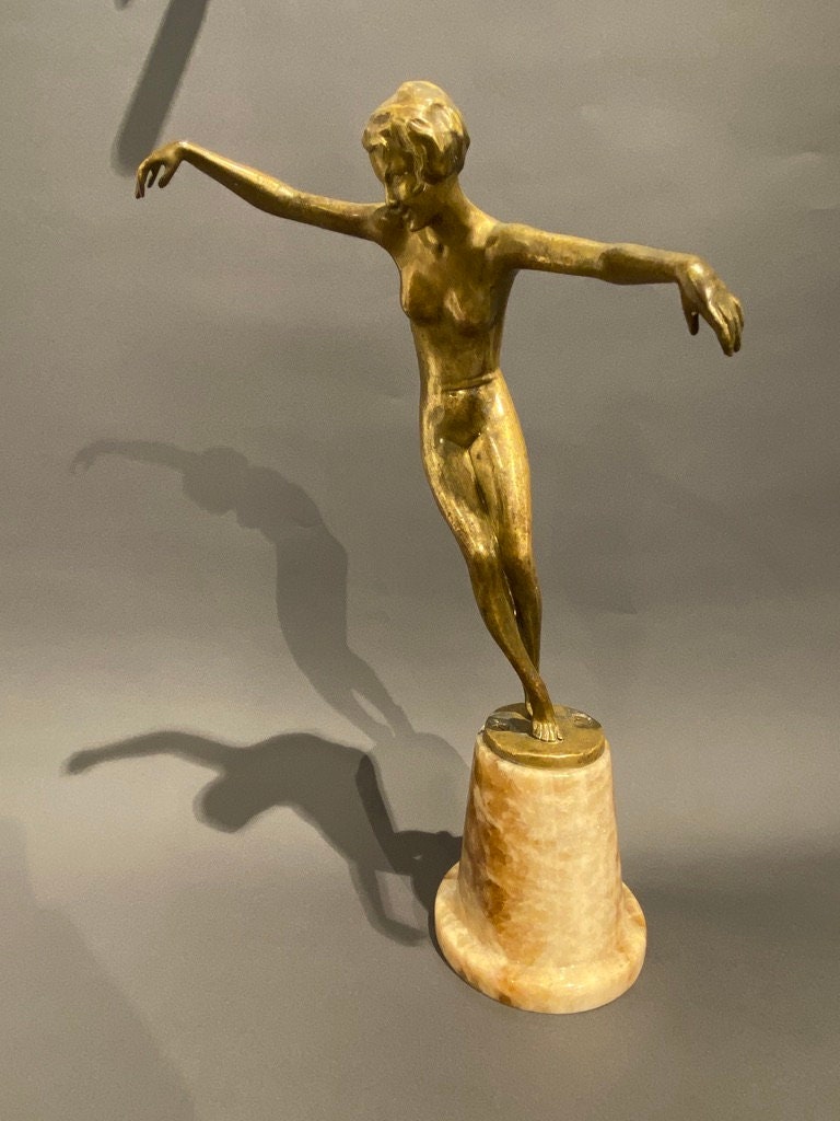 Josef Lorenzl Bronze statue of a naked expressive dancer mounted on an ony base and signed Vienna around 1920 Very rare, beautiful condition