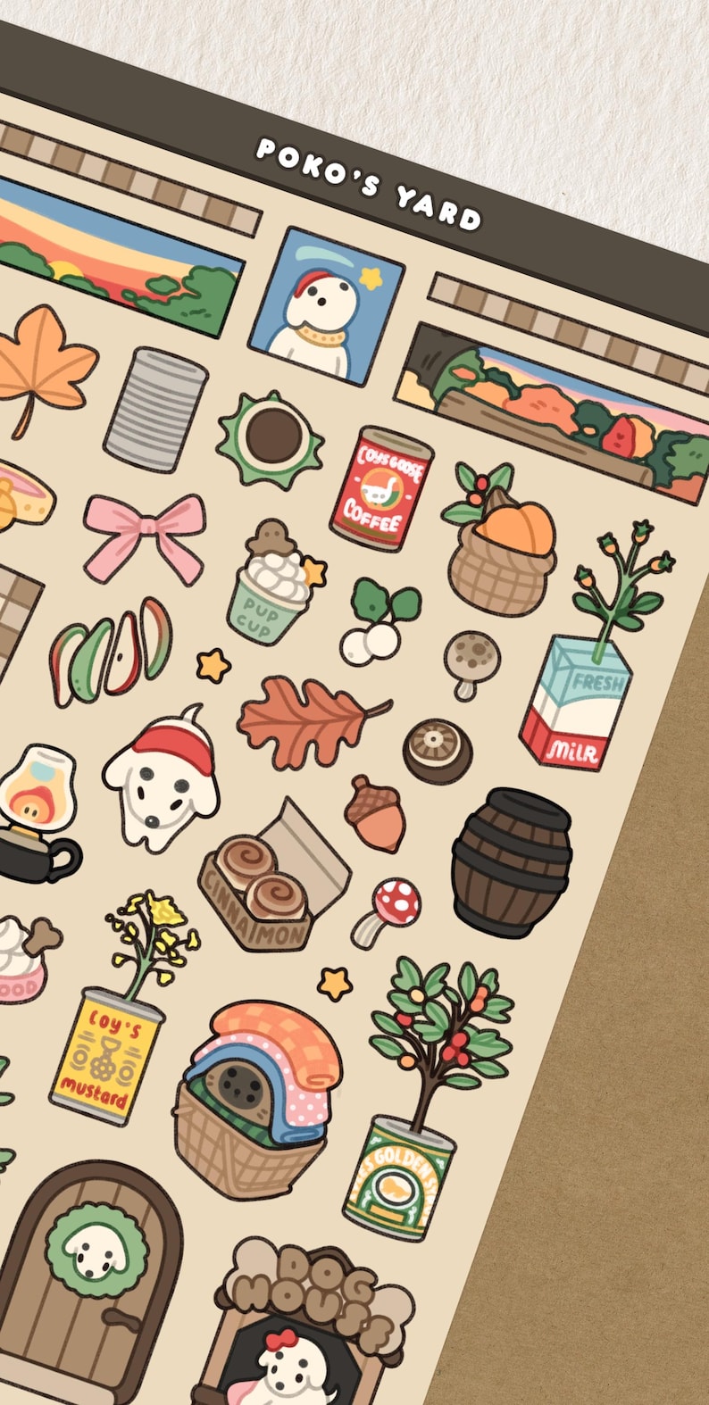 May include: A sheet of stickers with various illustrations, including a dog in a Santa hat, a coffee can, a milk carton, and a basket of pumpkins. The text "POKO'S YARD" is at the top.