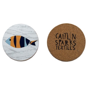 Circular blue and orange striped fish Coaster - Melamine with a cork backing