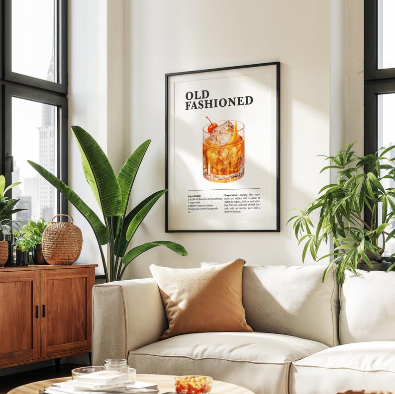 May include: A printable poster with a black frame, featuring a recipe for an Old Fashioned cocktail. The poster has a white background with black text and a watercolor illustration of an Old Fashioned drink with a cherry garnish.