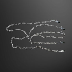 May include: A silver chain with three metal clips. The chain is laid out in a loose, overlapping pattern.
