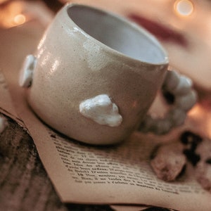 Handmade ceramic mug decorated with cloud image 10