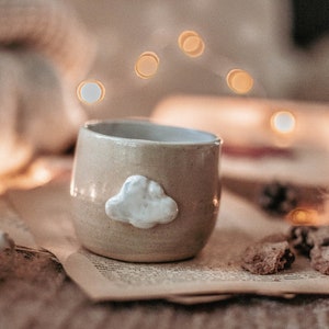 Handmade ceramic mug decorated with cloud image 9