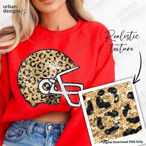 May include: A red sweatshirt featuring a football helmet design with a leopard print pattern. The helmet is outlined in white and filled with gold sequins and black spots. The image also includes a smaller image of the leopard print and the text "Realistic texture" and "Digital Download PNG Only".