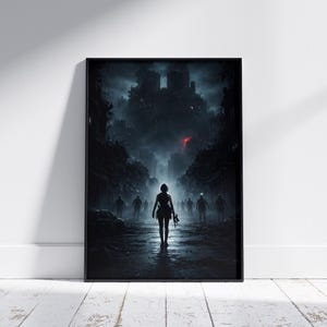 Framed dark apocalypse creature poster leaning against a wall, depicting a massive molten beast rising in a destroyed city with fire and smoke filling the skyline. This dramatic horror wall art adds bold cinematic intensity to any living space or studio.