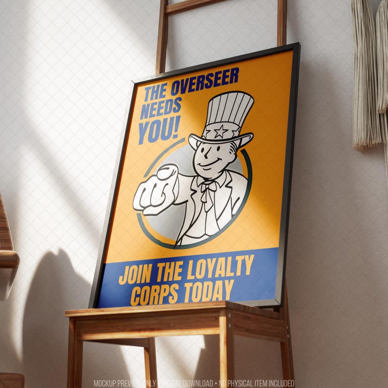 Framed retro-inspired recruitment style poster displayed on a wooden easel in a bright modern interior. The artwork features a cheerful illustrated mascot pointing toward the viewer with bold blue and golden yellow colors, vintage propaganda-inspired typography and classic comic styling. Designed for retro gaming decor, sci fi wall art, post-apocalyptic themed rooms, gaming graphics collections and movie poster inspired interiors while remaining suitable for contemporary home or office display.