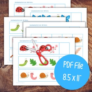 May include: A collection of spring-themed pattern cards featuring ladybugs, butterflies, caterpillars, and snails. Red scissors are placed on top. A blue circle in the corner reads "PDF File 8.5 x 11" (approx. 21.6 x 28 cm).