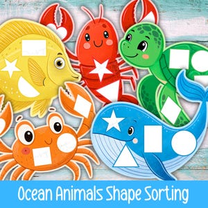 May include: Colorful ocean animal cutouts for shape sorting. Includes a yellow fish, orange crab, red lobster, green turtle, and blue whale. Each animal has a cutout for inserting shapes like squares, circles, and triangles. The text "Ocean Animals Shape Sorting" is at the bottom.