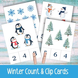 May include: Winter count and clip cards with illustrations of snowflakes, snowmen, penguins, and fir trees. Each card shows a winter image and a number. Includes wooden pegs for clipping. The text at the bottom reads "Winter Count & Clip Cards."