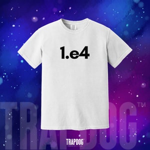May include: White t-shirt with black text that reads "1.e4" on the front. The shirt is a crew neck style and has short sleeves. The text is centered on the shirt.