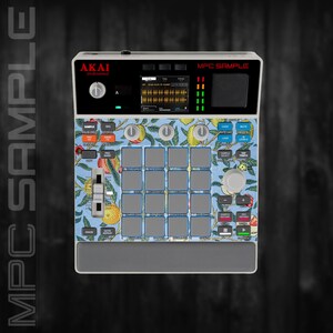 May include: An Akai MPC Sample music production centre with a blue floral design. The device has a screen, buttons, and pads for creating music. The text "MPC SAMPLE" is visible on the top of the device.