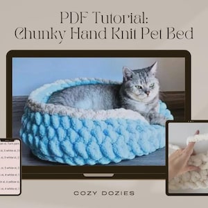 May include: A digital display shows a gray cat resting in a blue and white chunky hand-knit pet bed. The text "PDF Tutorial: Chunky Hand Knit Pet Bed" is at the top. A smartphone and tablet display additional images. The text "COZY DOZIES" is at the bottom.