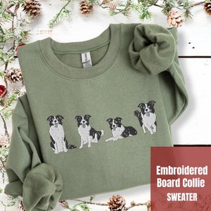 Peut inclure: Un sweat-shirt vert avec des images brodées de quatre border collies noirs et blancs. Le texte "Embroidered Board Collie SWEATER" est dans le coin inférieur droit de l'image.