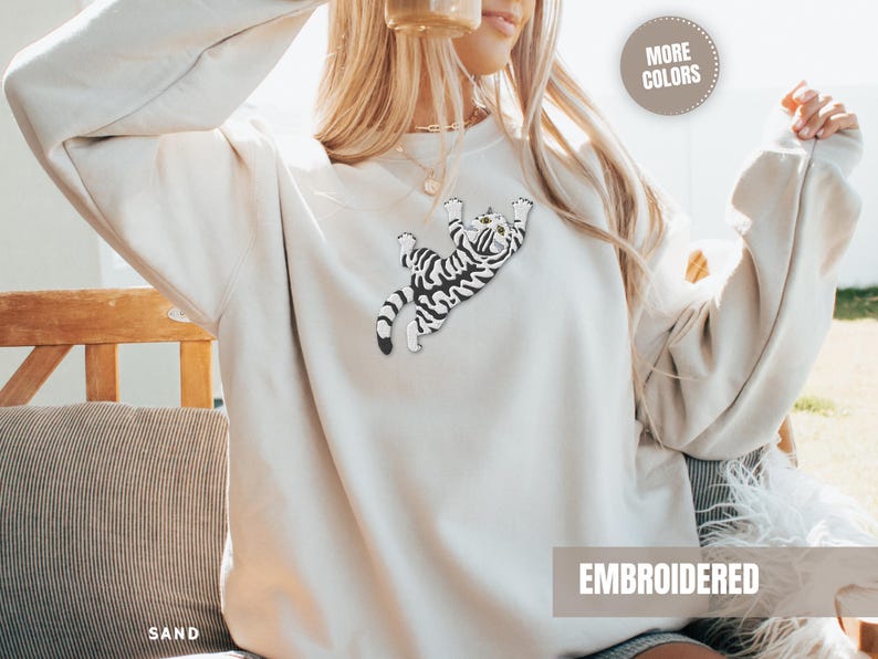 Grey Tabby Kitten Sweatshirt Embroidered Design Women Climbing Cat Pullover Top Large Chest Detail Quality Stitching Soft Cotton Blend Construction Cozy Comfortable Fit Animal Lover Apparel Perfect Gift Cat Mom Pet Parent Present Casual