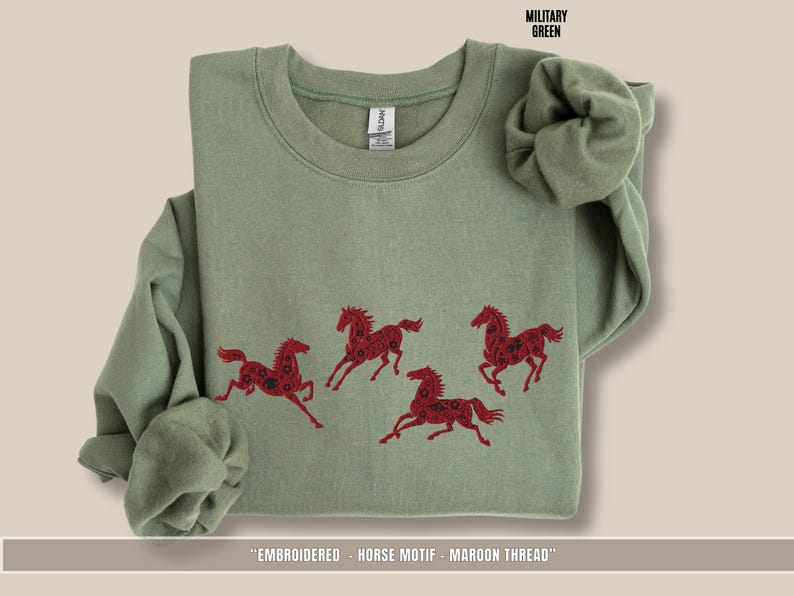Military green sweatshirt with maroon & black embroidered horse design shown in flat lay view