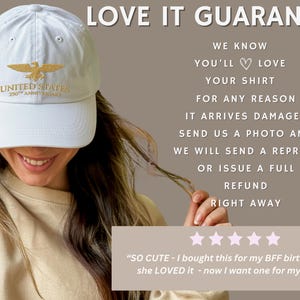 White embroidered United States 250th anniversary cap worn by model with love it guarantee message.