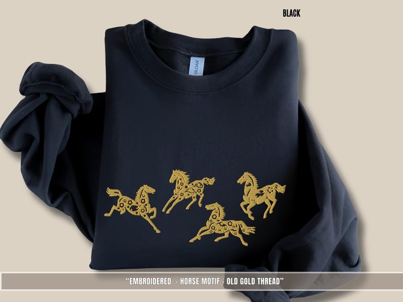 Black unisex sweatshirt with old gold embroidered horses inspired by equestrian and Scandinavian folklore style