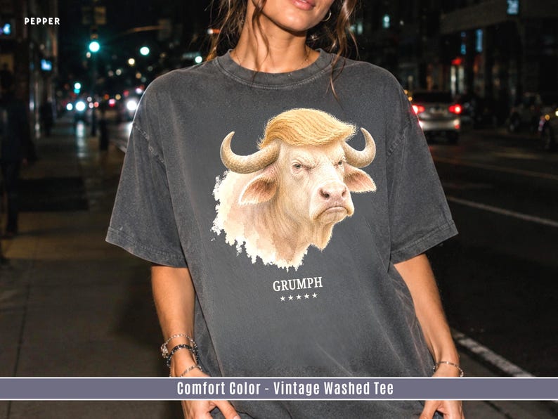 GRUMPH funny albino buffalo graphic shirt on Pepper Comfort Colors tee with grumpy bull portrait and festival streetwear style.