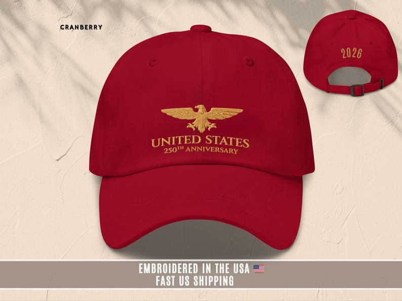 Red embroidered United States 250th anniversary baseball cap with eagle logo, front and back shown.