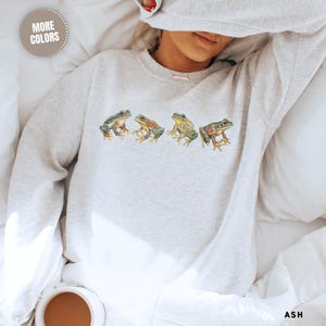 Unisex Apparel Frog Sweatshirt Nature Lover Gift Cottagecore Aesthetic Wildlife Crewneck Cozy Comfort Layer Boho Style Clothing Garden Enthusiast Present Amphibian Fan Casual Wear Perfect Birthday Gift Nature Inspired Design Quirky Fashion