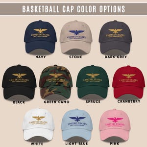 Dark grey embroidered United States 250th anniversary cap with gold eagle embroidery, front and back views.