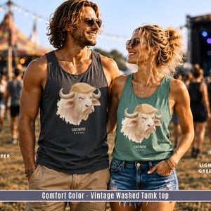 GRUMPH buffalo unisex tank tops on festival couple wearing Pepper and Light Green Comfort Colors tank tops.
