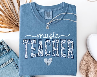 Chemise florale couleur confort pour professeur de musique, T-shirt pour professeur de musique, Cadeaux pour professeur d'orchestre, T-shirt de l'équipe de professeurs de rentrée scolaire