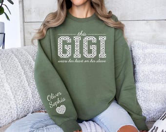 Custom Gigi Sweatshirt, This Gigi Wears Her Heart On Her Sleeve Sweater, Gigi Sweatshirt With Kids Name On Sleeve, Custom Grandma Gifts