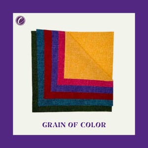 May include: A stack of colorful square fabric napkins in shades of green, teal, red, pink, purple, and yellow. The text "GRAIN OF COLOR" is printed at the bottom of the image.