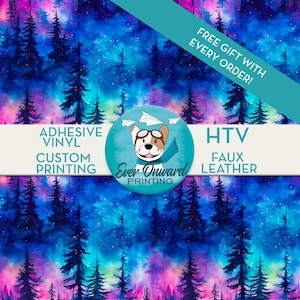 May include: A vibrant, digitally printed pattern featuring a forest scene with tall, dark blue trees against a backdrop of swirling blues, purples, and pinks. The image includes text that reads "ADHESIVE VINYL CUSTOM PRINTING" and "HTV FAUX LEATHER". A teal banner states "FREE GIFT WITH EVERY ORDER!"