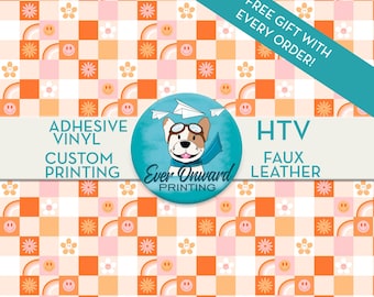 May include: A cheerful pattern of orange and pink squares with smiley faces, flowers, and rainbows. The text "FREE GIFT WITH EVERY ORDER!" is in a blue banner at the top. The text "ADHESIVE VINYL CUSTOM PRINTING" is in a circle with a white background and a blue border. The text "HTV FAUX LEATHER" is in a circle with a white background and a blue border. The text "Ever Onward PRINTING" is in a circle with a blue background and a white border. A cartoon dog wearing aviator goggles and a blue scarf is in the center of the circle.