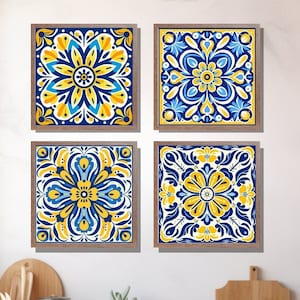 May include: Four square wall art prints with a blue and yellow geometric pattern. The prints are framed in wood with a light brown finish.