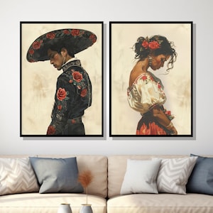 May include: Two framed paintings depicting a man and a woman in traditional Mexican attire. The man is wearing a black suit with red floral embroidery and a wide-brimmed hat with red roses. The woman is wearing a white blouse with red floral embroidery and a red skirt. Both figures are looking down.