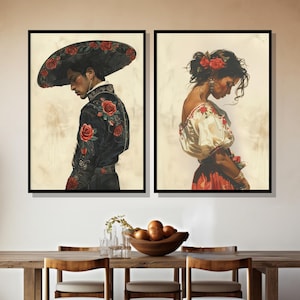 May include: Two framed paintings depicting a man and a woman in traditional Mexican attire. The man is wearing a black suit with red floral embroidery and a wide-brimmed hat. The woman is wearing a white blouse with red floral embroidery and a red skirt.
