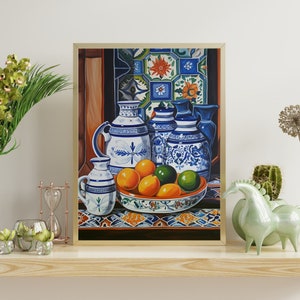 May include: A still life painting of blue and white ceramic pitchers and a bowl of oranges and limes. The pitchers have intricate floral designs and are arranged on a tiled surface.